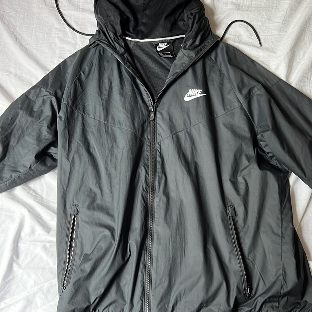 Black Nike rain jacket. Size large